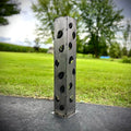 Silver metal solar pillar luminary with leaf cutout pattern and base mount
