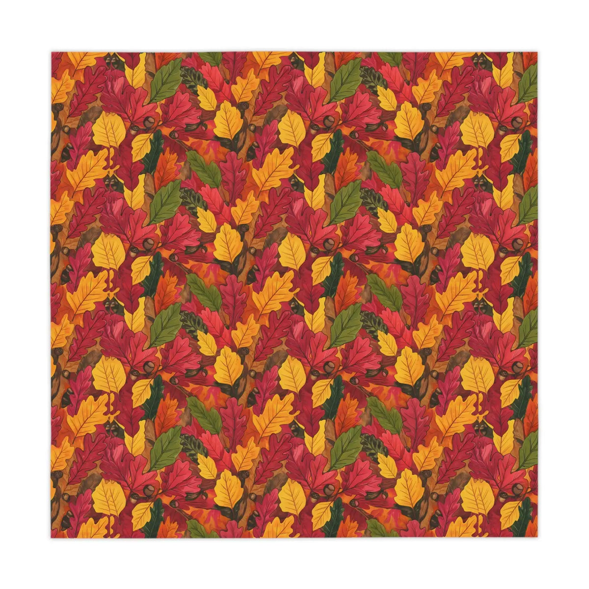 Leaf-patterned tablecloth fabric with red, yellow, and green autumn foliage