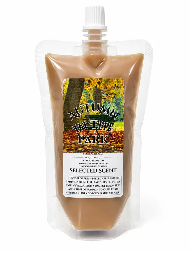 Squeezable wax melt pouch with white cap, transparent bag of beige wax and Autumn Park label