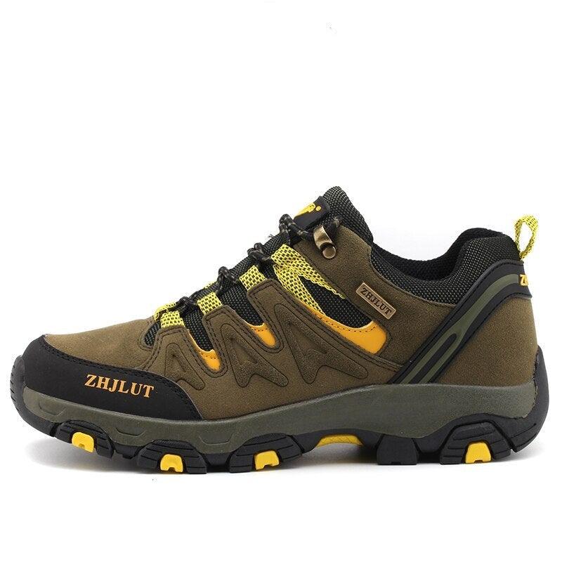 Low-top hiking shoes in brown with black, neon yellow laces and rugged tread sole