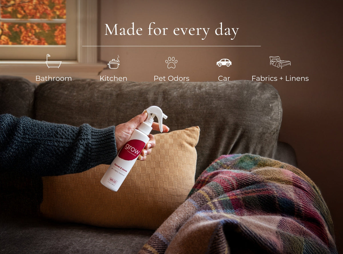 Air and fabric spray bottle spraying a couch cushion with 'grow' logo