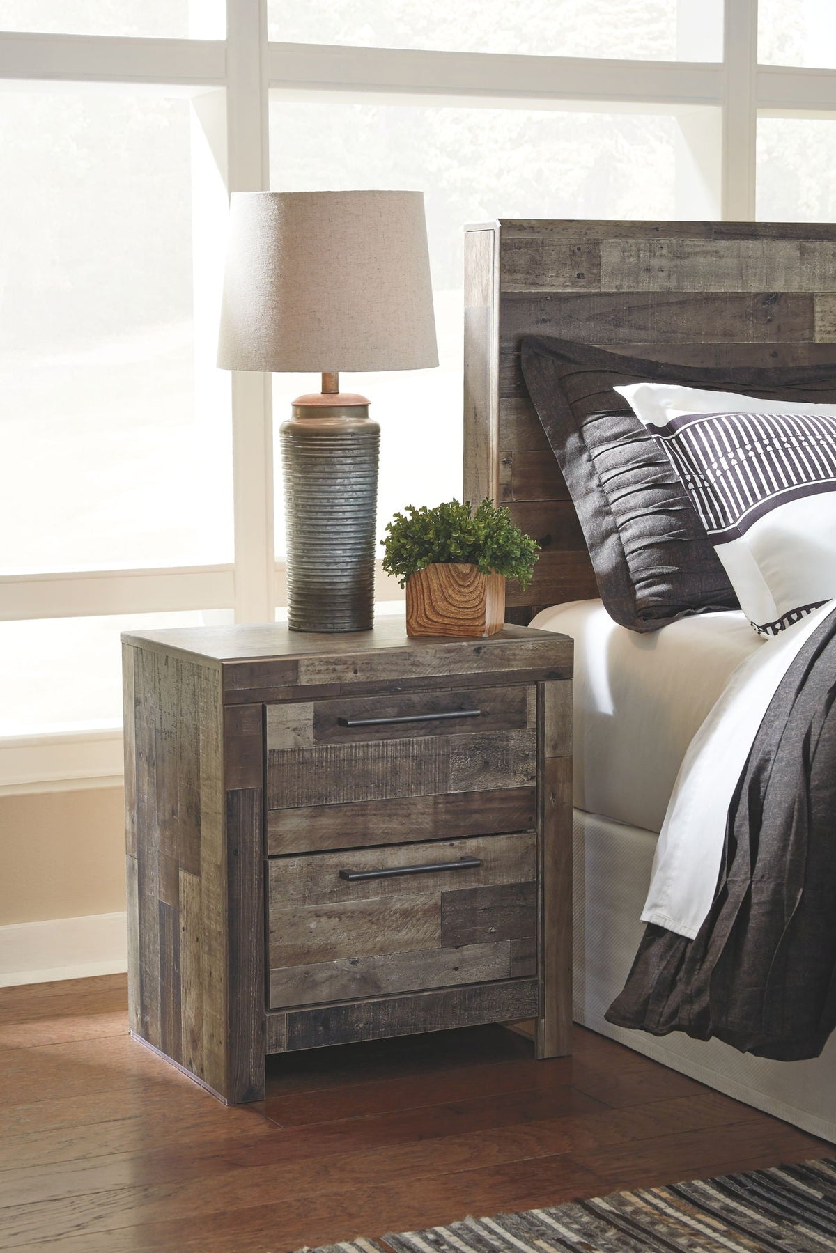 Derekson youth nightstand with two drawers and rustic dark wood finish