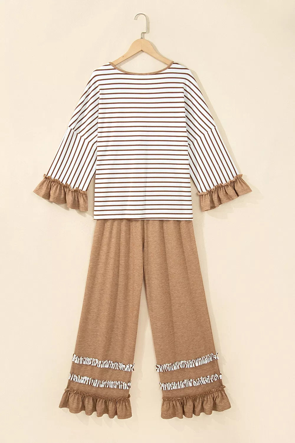 Back view of camel striped V-neck ruffle sleeve top with drawstring pants