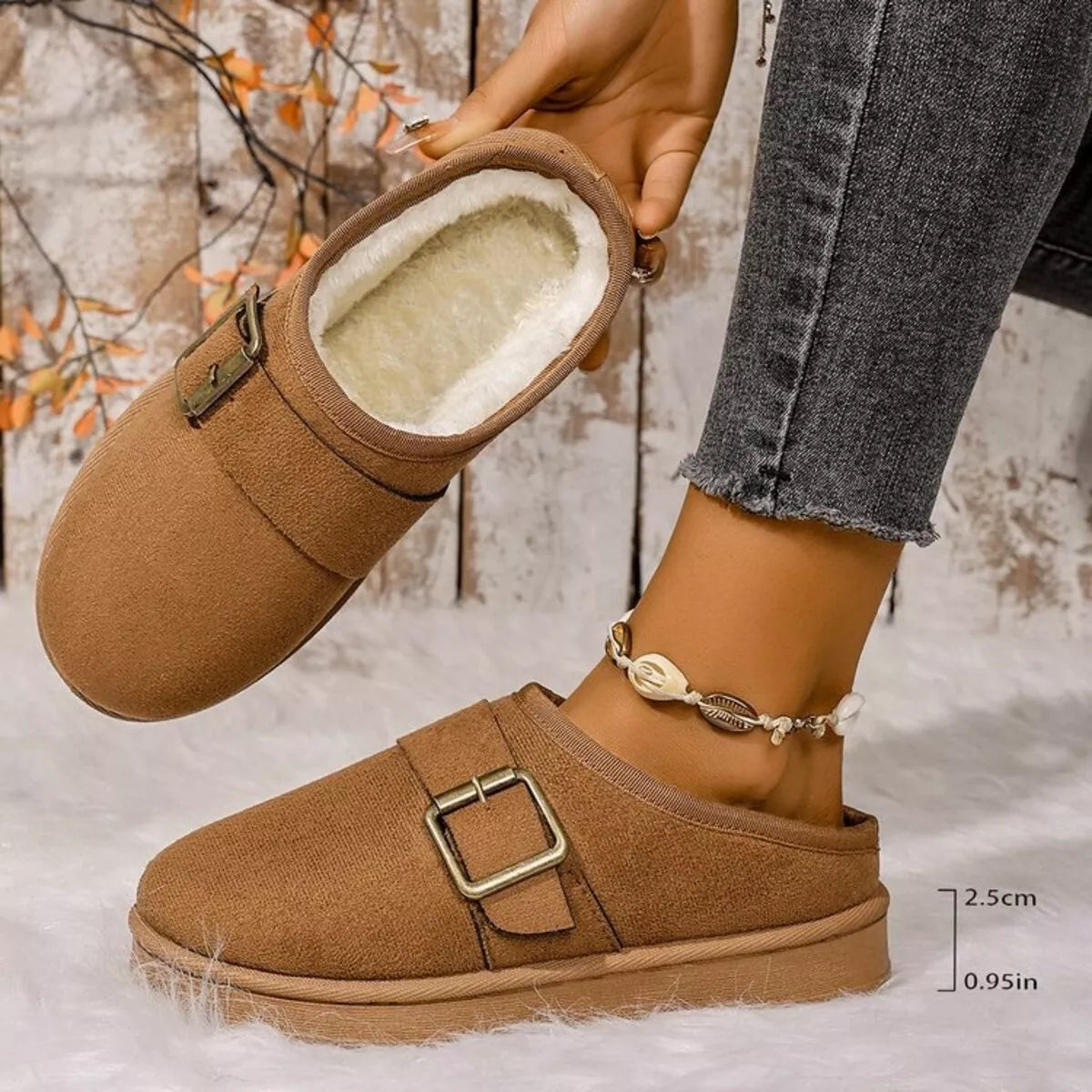 Caramel plush-lined slipper with open cuff showing fuzzy insole and metal buckle