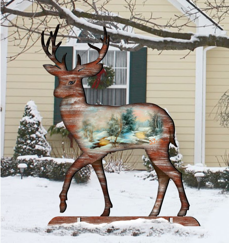 Outdoor yard sign featuring a painted deer with antlers and snowy scene, on a stake
