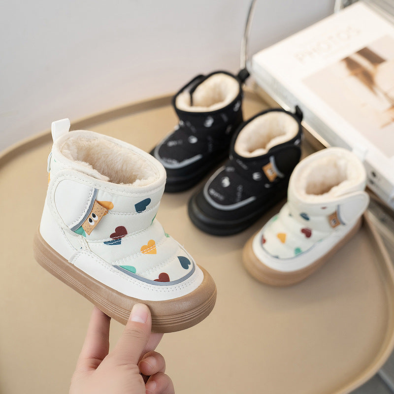 Kids winter ankle boots, white with colorful animal prints, tan sole, fuzzy lining