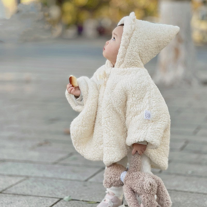 Cream sherpa hooded cape with front pouch and small chest bunny emblem