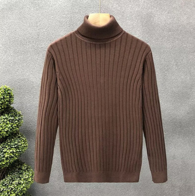 Brown ribbed turtleneck sweater with long sleeves and knit collar.