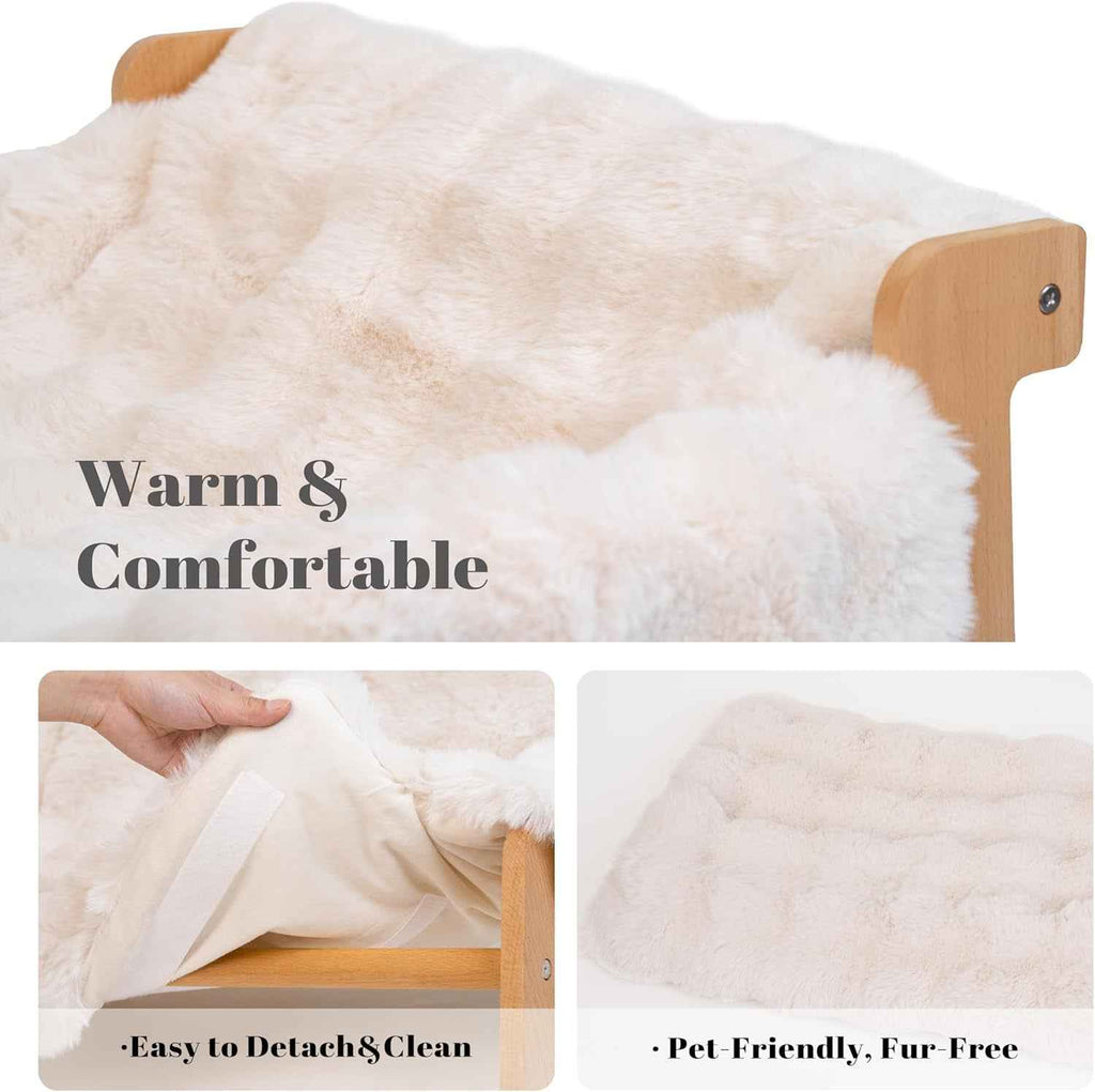 Cat couch bed with a removable, washable fluffy cream cushion and wooden frame.