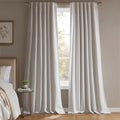 White blackout curtain panel pair with grommet-style metal top rings