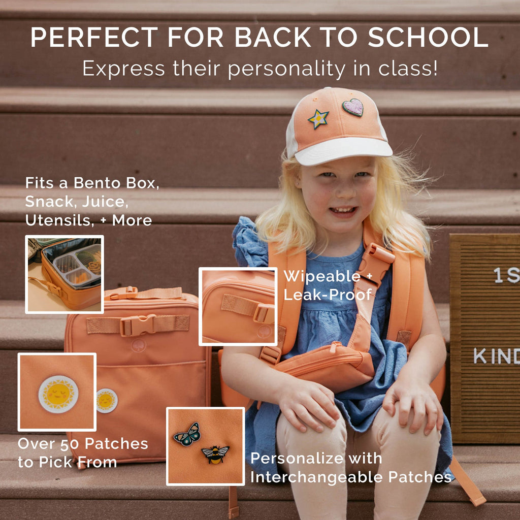 Kids lunch box bag in coral-pink with front patches and main zipper closure