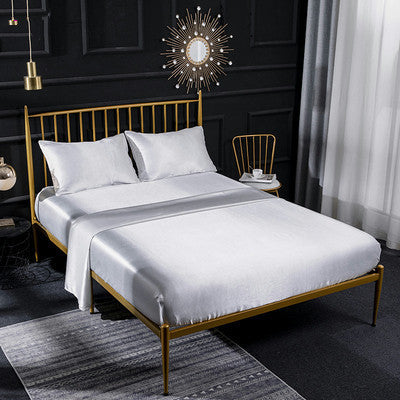 Satin bedding set with light silver sheet and matching pillowcases, 4-piece set