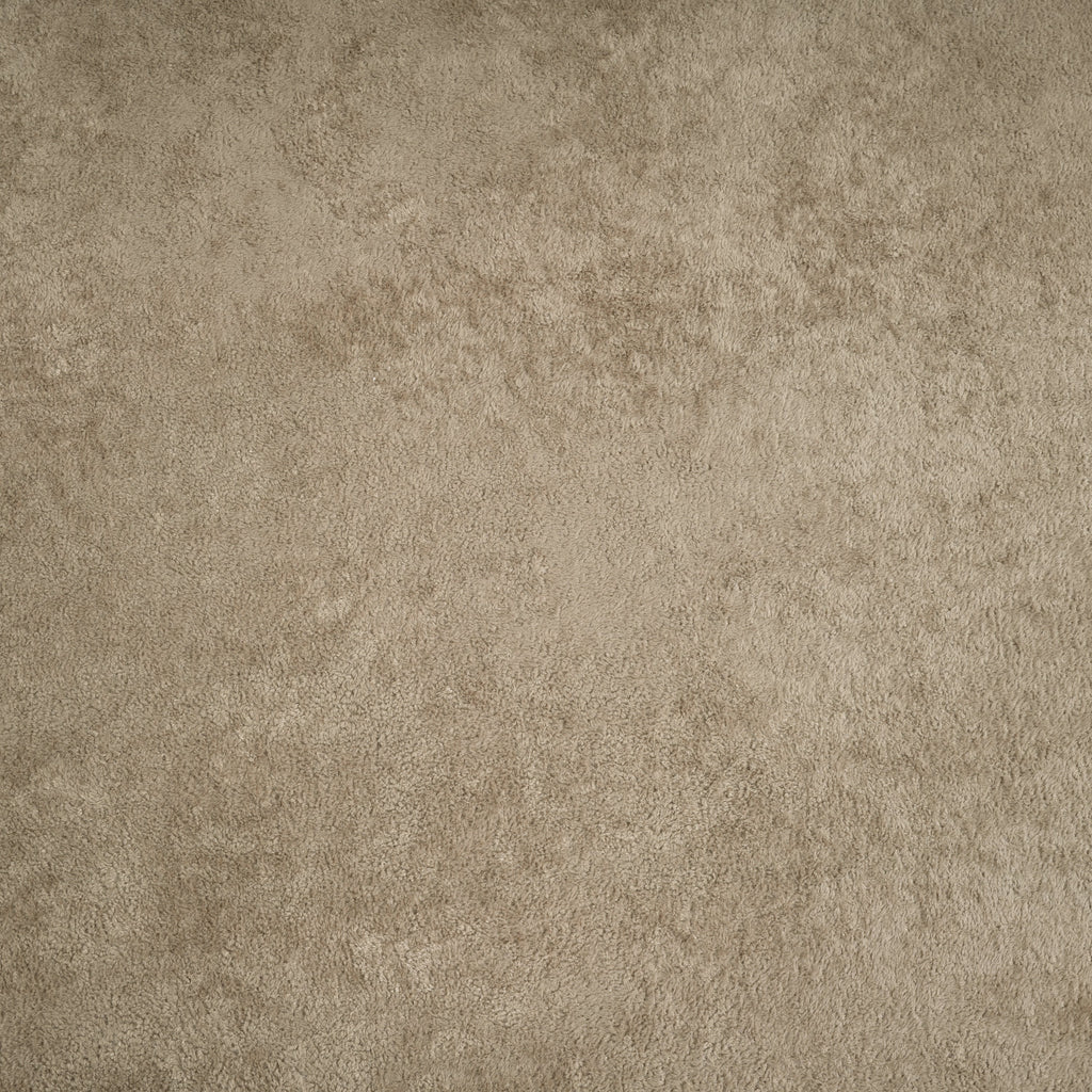 Brown fabric swatch with textured, suede-like surface
