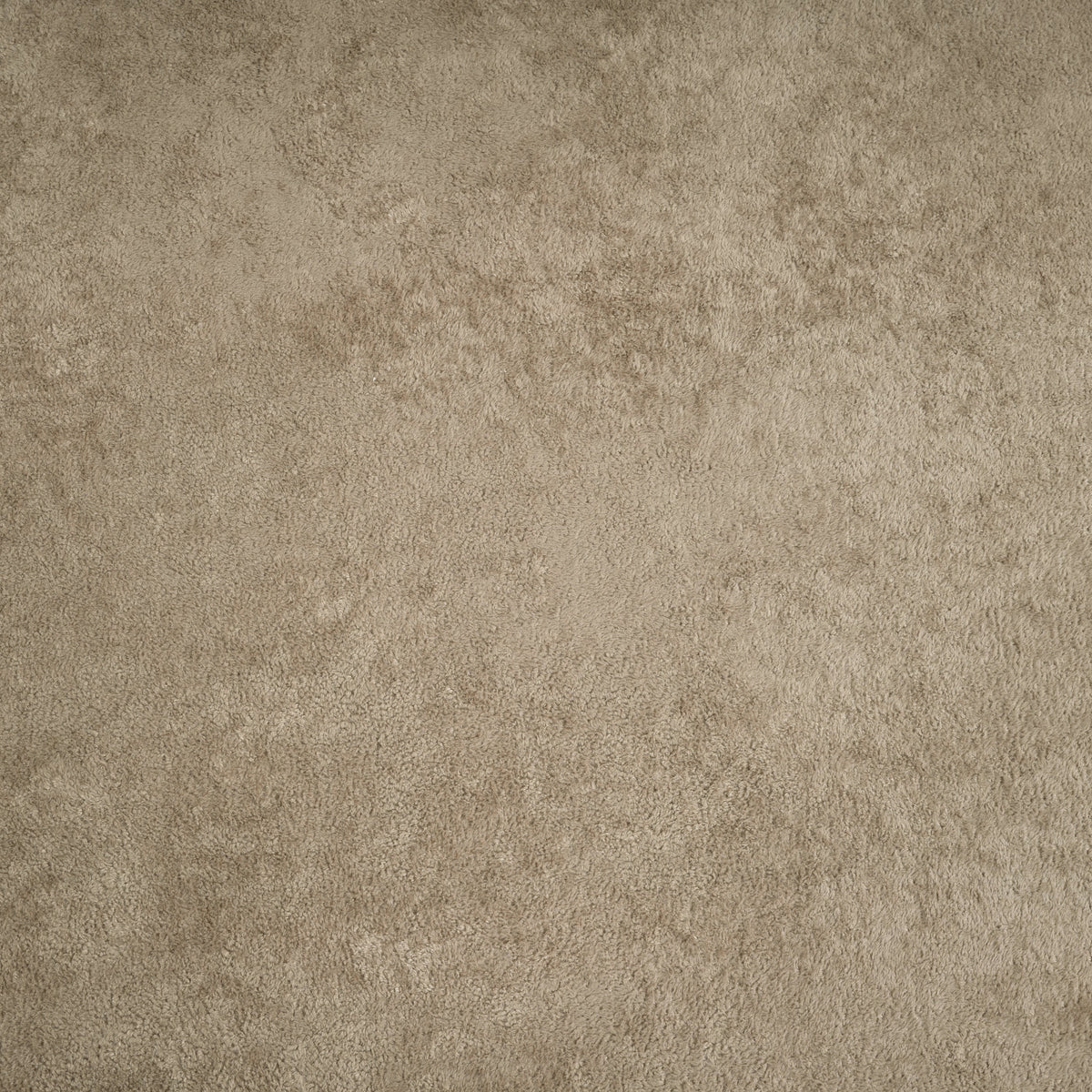 Brown fabric swatch with textured, suede-like surface