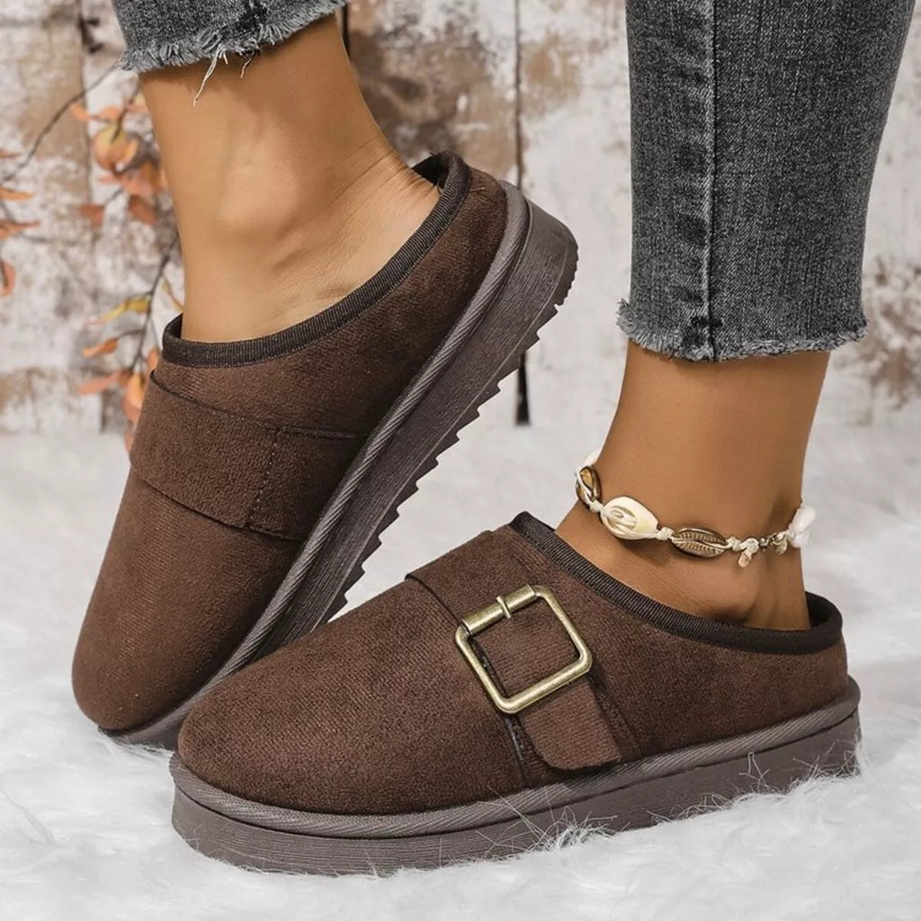 Chocolate-brown plush-lined slippers, side view, with front buckle and padded lining
