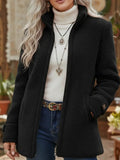 Women's black fleece zip-up jacket with stand collar, long sleeves