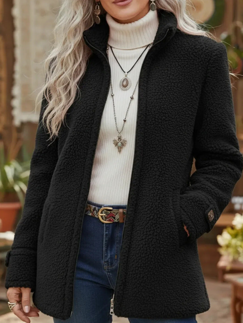 Women's black fleece zip-up jacket with stand collar, long sleeves