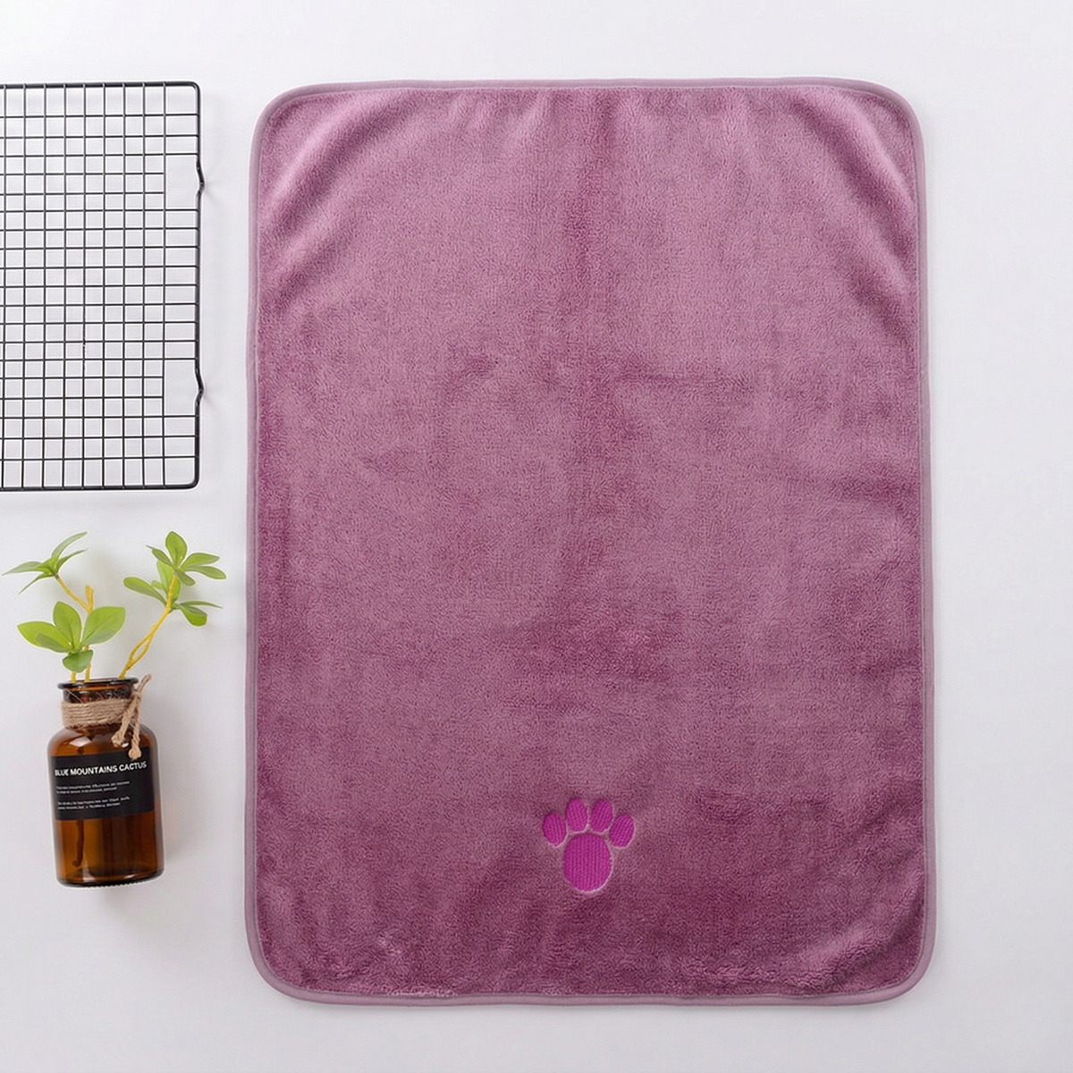 Quick-dry towel, purple square with stitched edge and paw-print emblem
