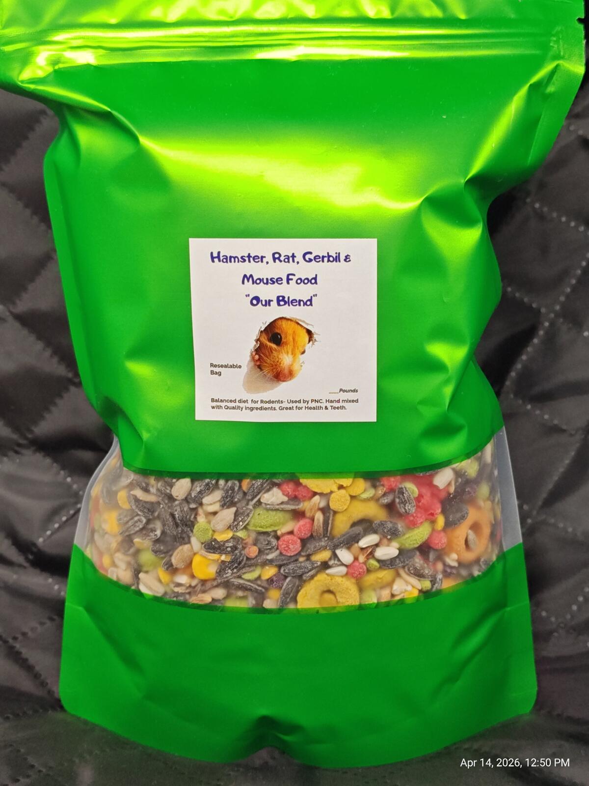 Green standing rodent food pouch, resealable, with label and visible kibble filling.
