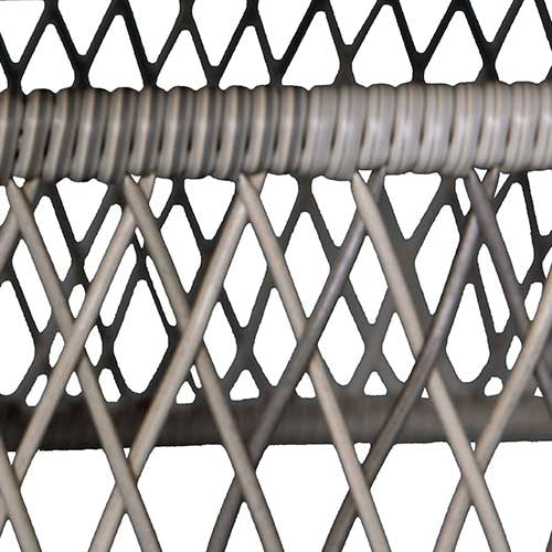 Close-up of gray wicker mesh weave on outdoor rattan chair frame