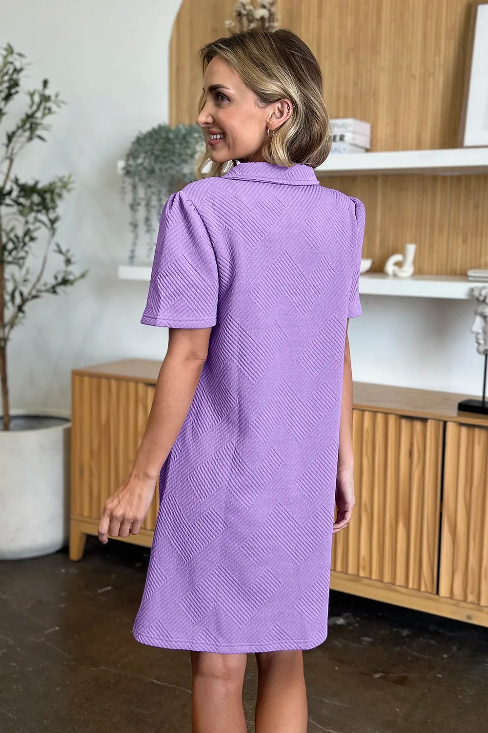 Lavender textured collared short-sleeve shift dress, back three-quarter view