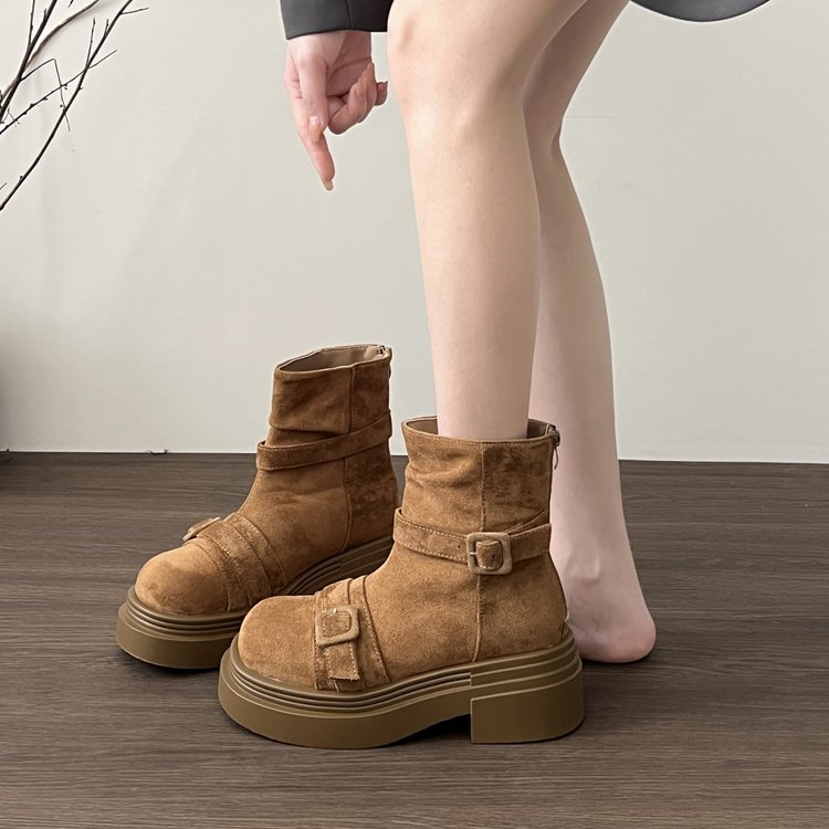 Brown suede ankle boots with double side straps and rounded platform sole