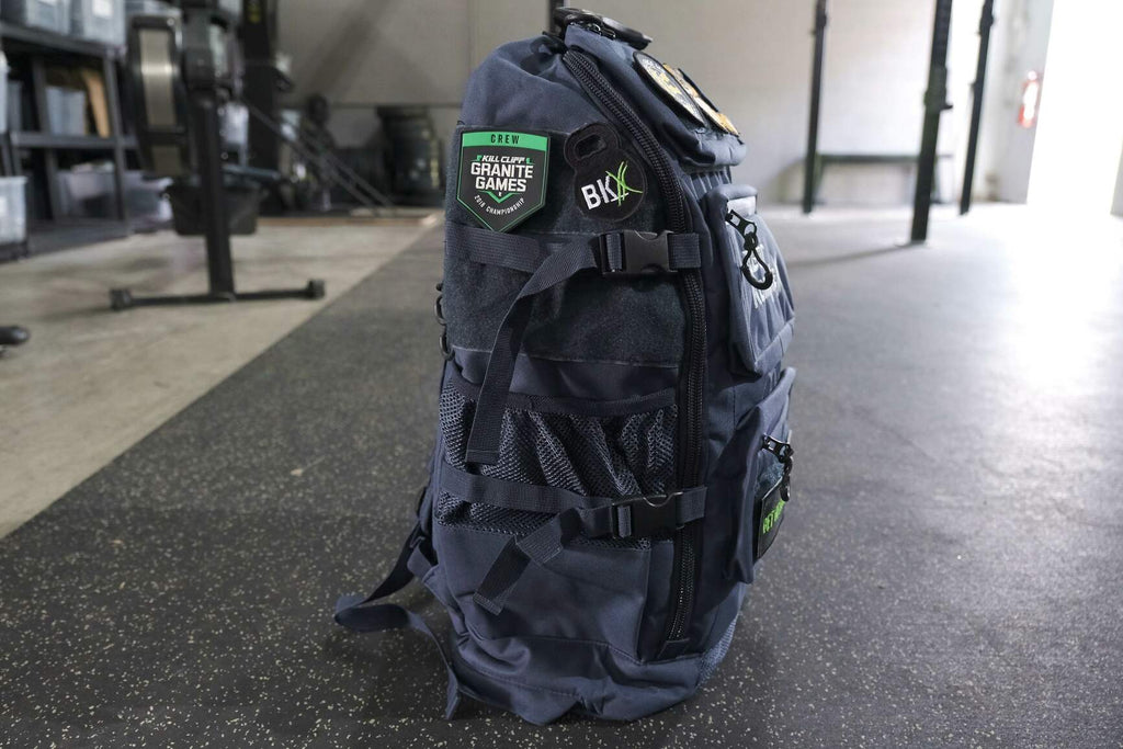 BKX black military backpack, rear view with padded back panel and adjustable straps