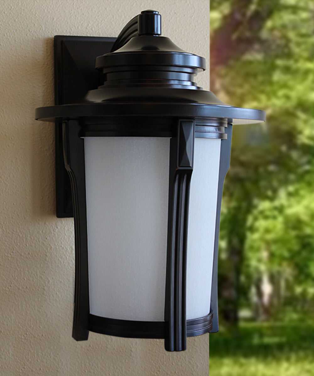 Outdoor wall lantern in dark bronze with frosted glass panels and side mount