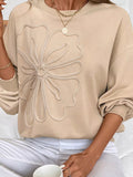 Beige drop-shoulder sweatshirt with large embroidered flower on front