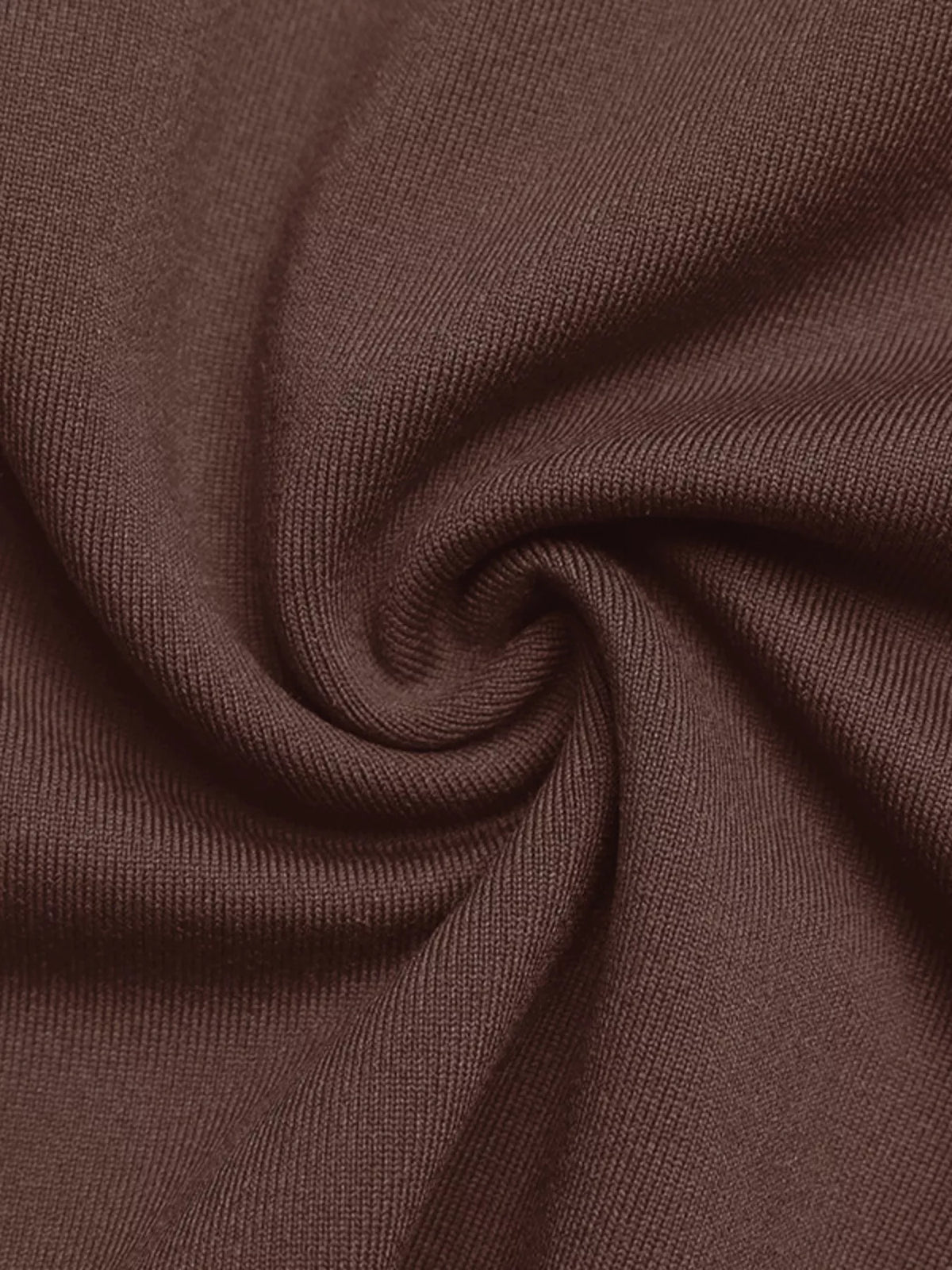 Brown textured fabric close-up for the bodysuit