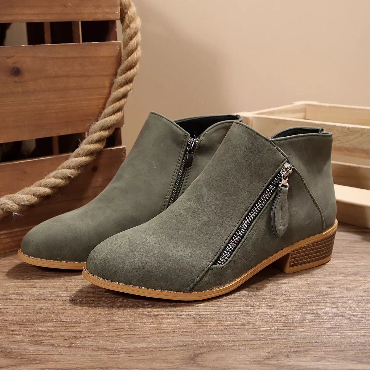 Sage green suede ankle boots with side zipper and block heel