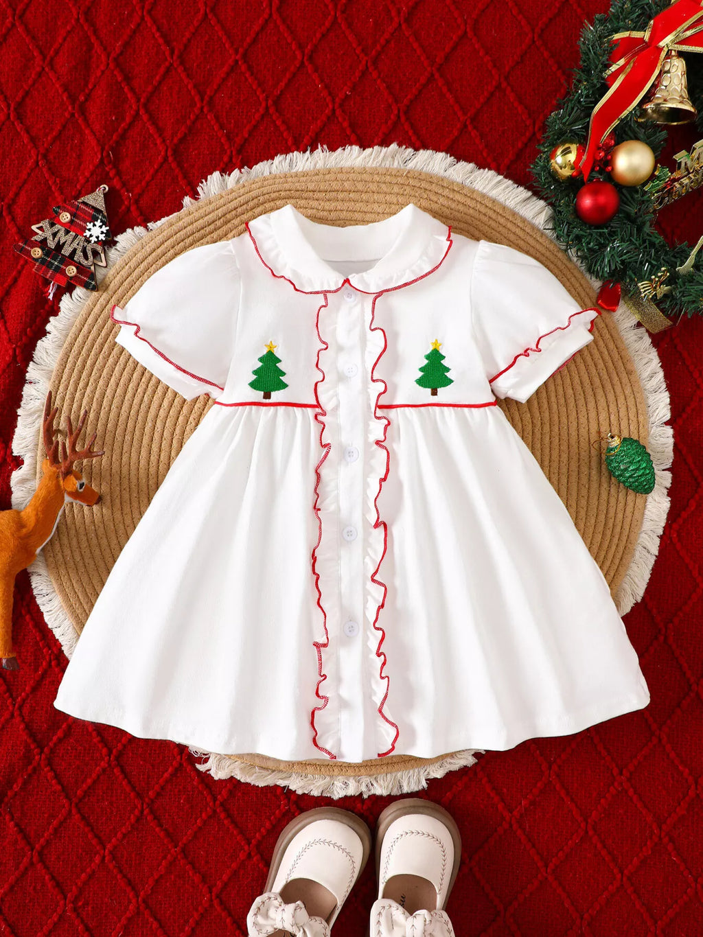 White embroidered Christmas dress with red ruffle trim and short sleeves