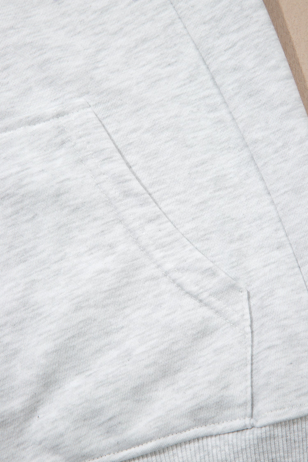 Light grey skort shorts with side seam and stitched panel lines
