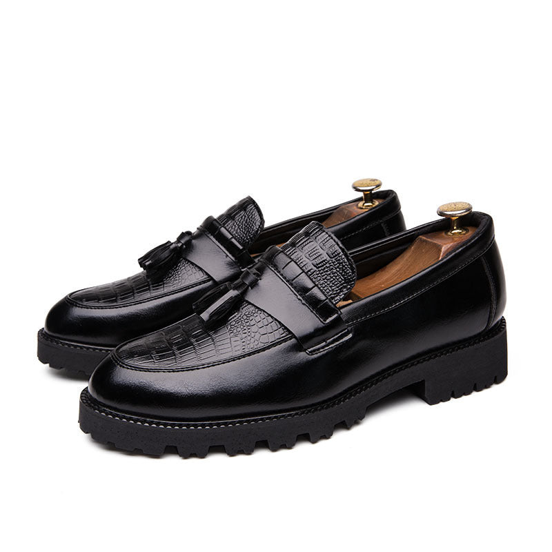 Men's leather loafers with tassel detail, black with embossed strap panels