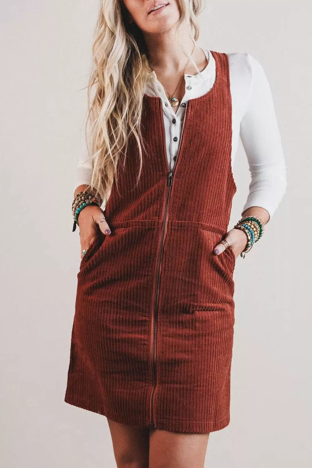 Burgundy ribbed corduroy zip-up sleeveless pocket sheath dress, front view