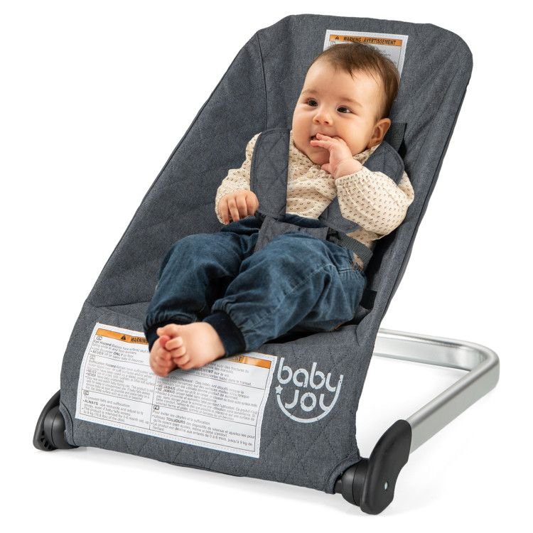 Dark gray baby bouncer seat with black base and newborn in padded liner