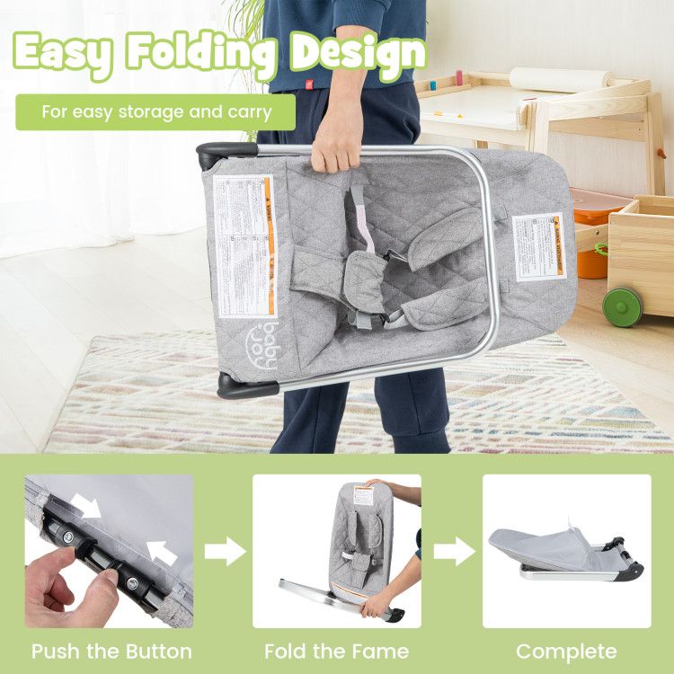 Gray baby bouncer seat folded for easy storage, compact metal frame shown