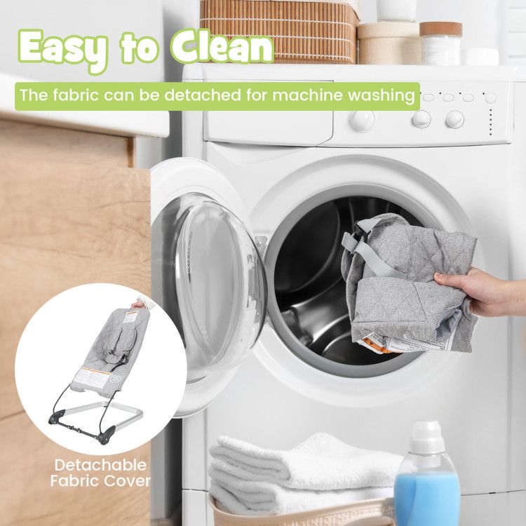 Gray baby bouncer seat fabric cover removed and placed into a washing machine