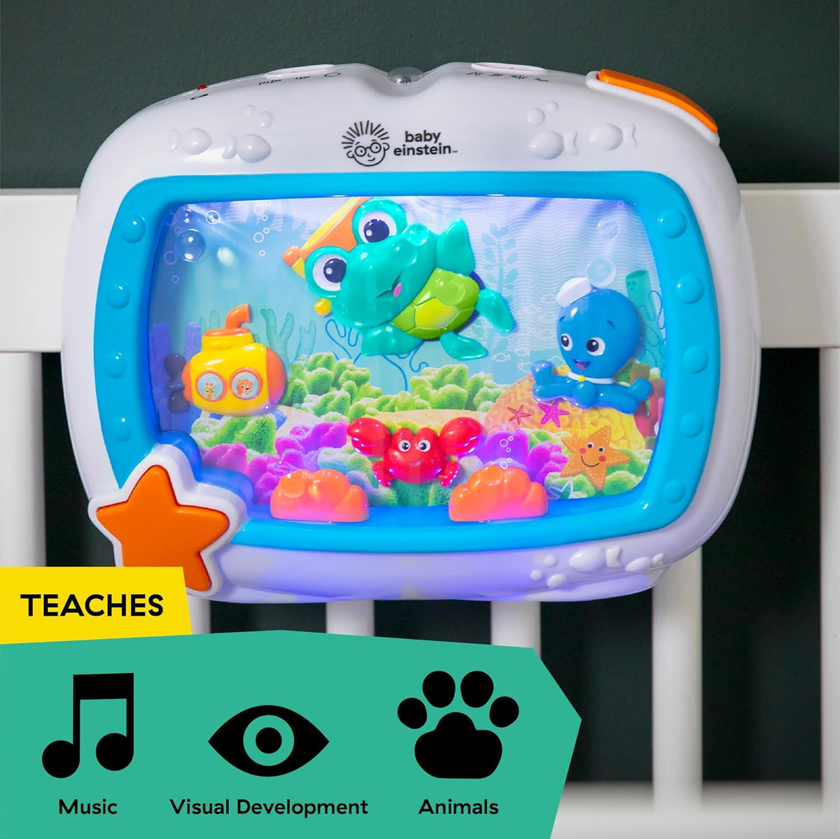Baby Einstein sea-themed musical crib toy with blue aquarium window and star-shaped base