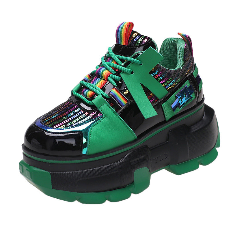 Green lace-up chunky sneaker with black accents, rainbow knit collar, and thick sole