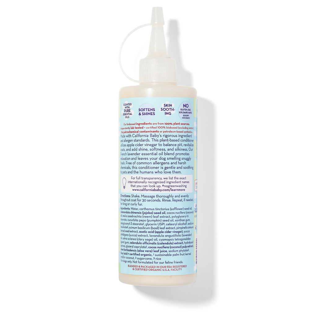Calming™ puppy and dog conditioner bottle with back label text and pump top