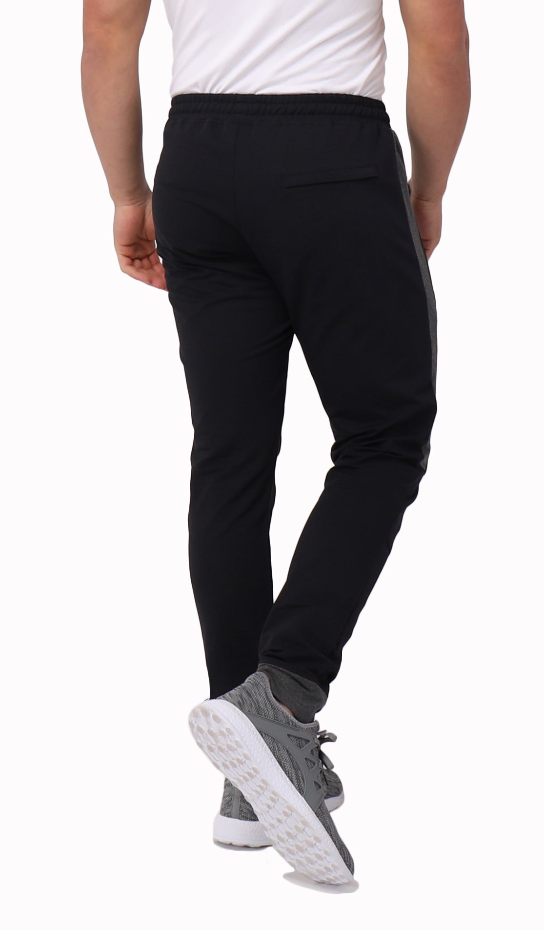 Tall fit jogger pants in dark black with elastic waistband and tapered ankle hem.