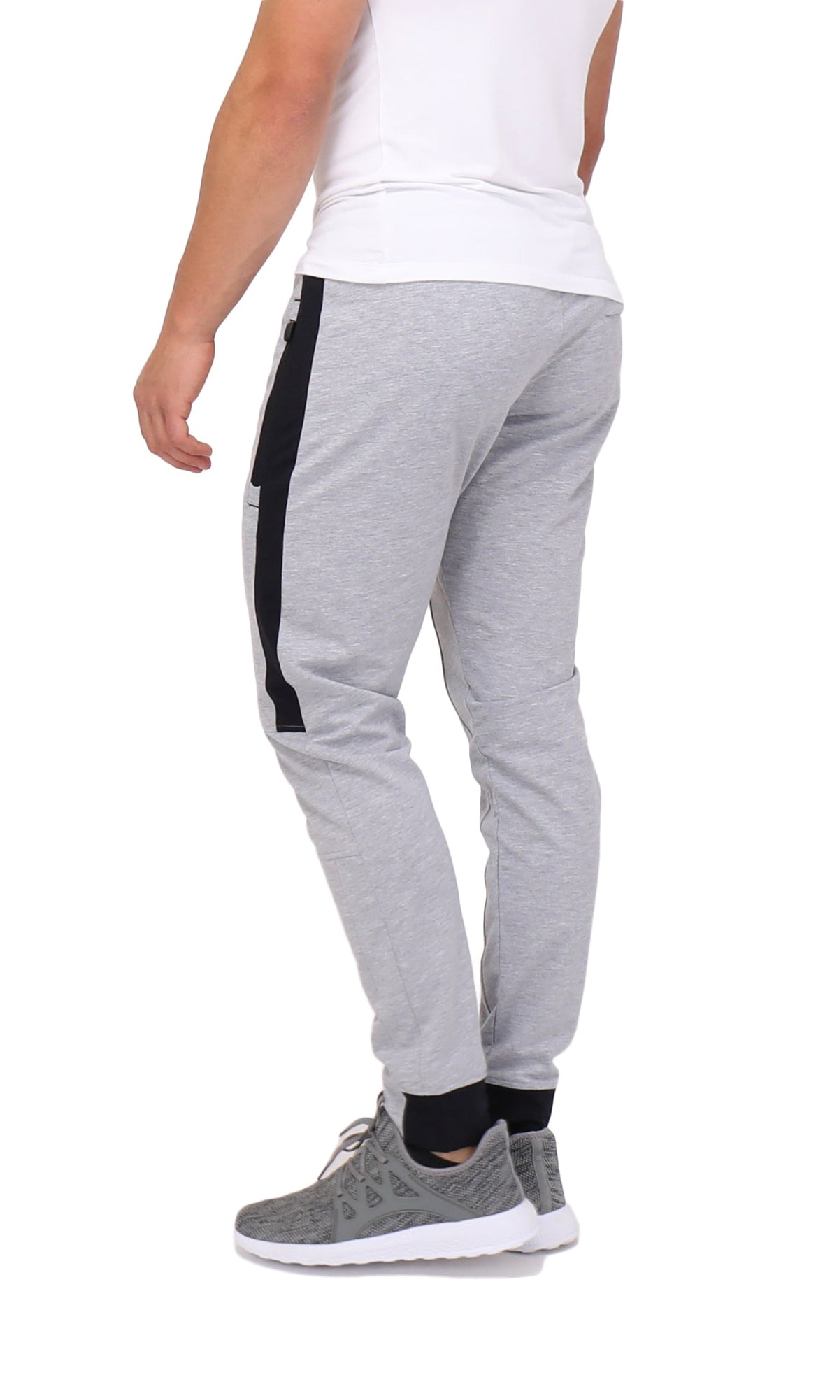 Tall fit jogger pants in light grey with black side stripe and cuffed ankle hem.