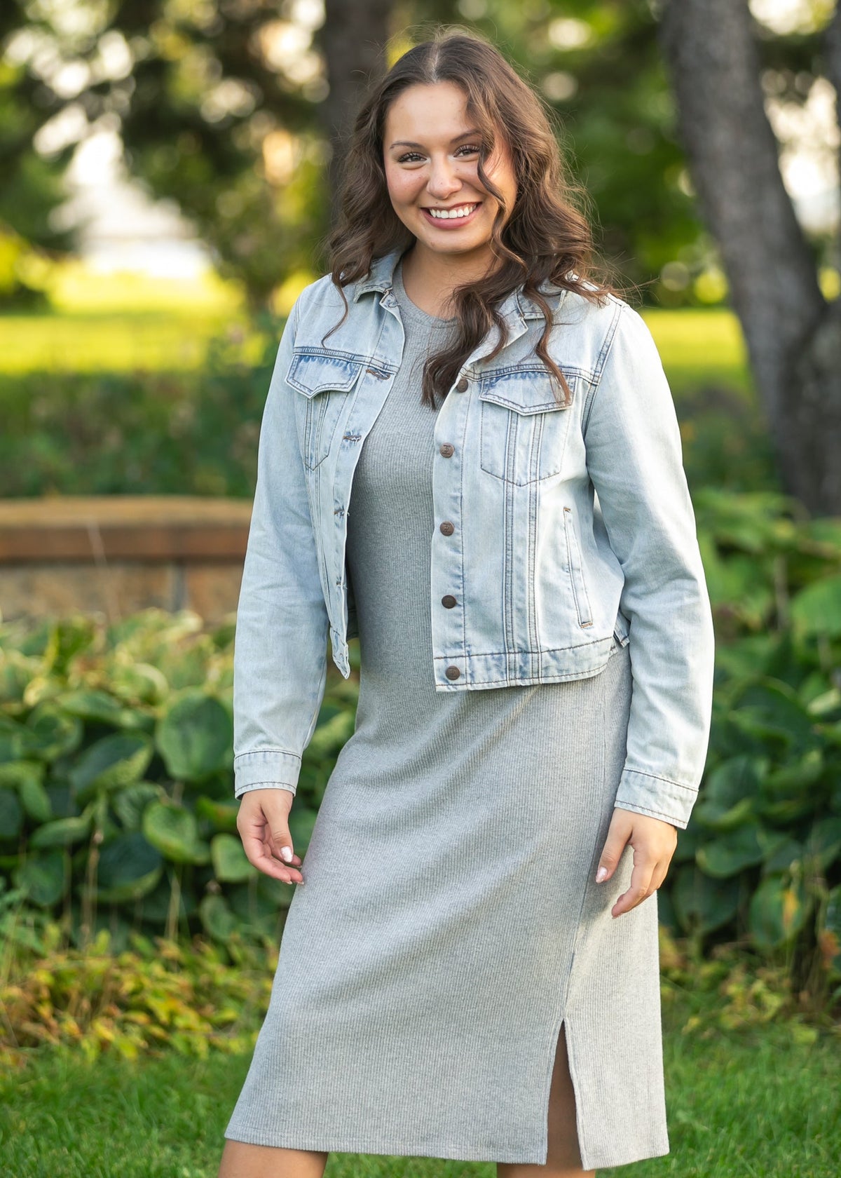 Gray ribbed t-shirt dress with crew neck, short sleeves, and front slit.