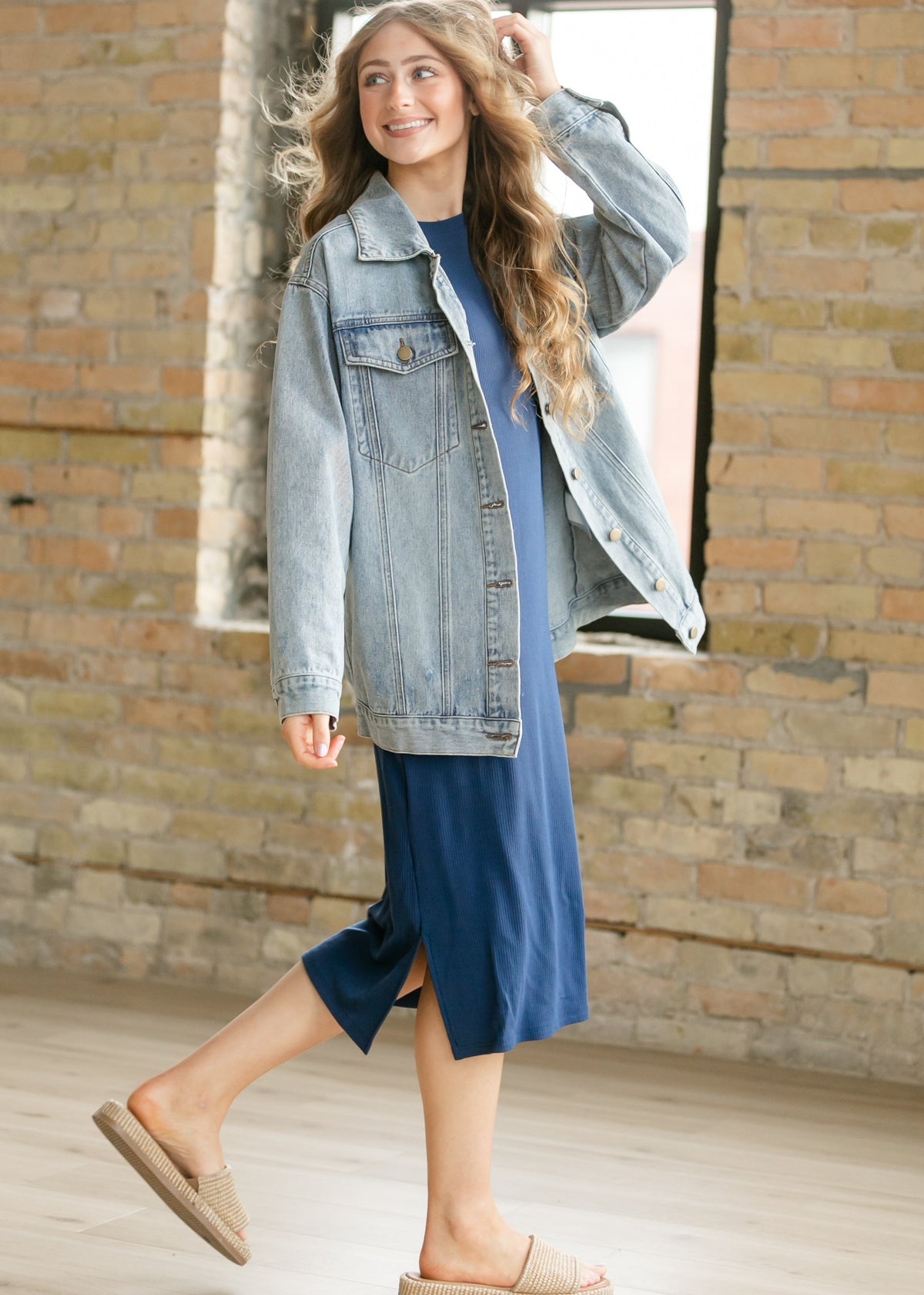 Navy ribbed t-shirt dress with crew neck, short sleeves, and side slit