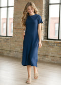 Navy ribbed t-shirt dress, crew neck and short sleeves, front side slit
