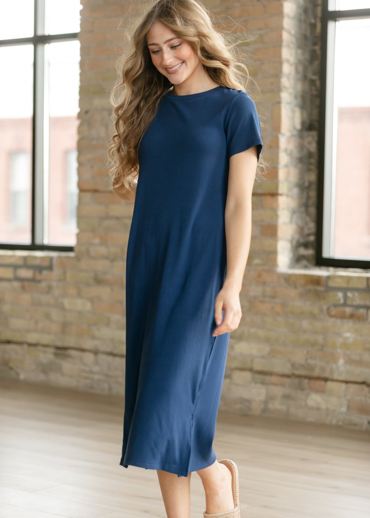 Navy ribbed t-shirt dress with crew neck and short sleeves, side slit