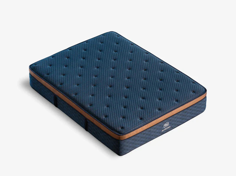 Blue cooling mattress with tufted quilted top, full profile view