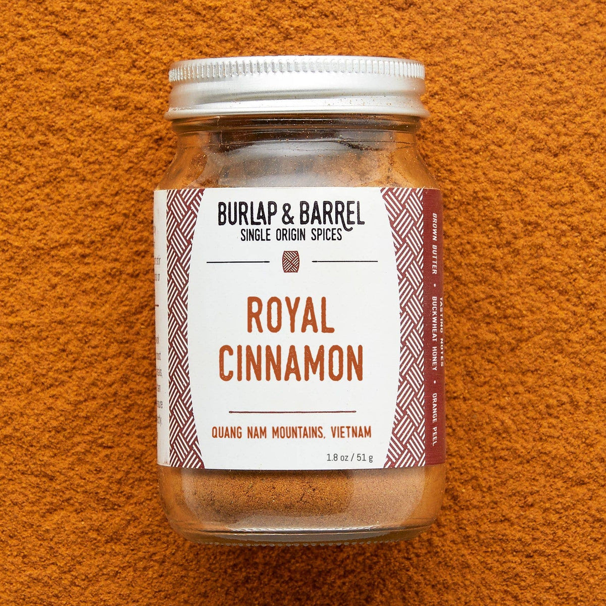 Royal Cinnamon spice jar with clear glass container and white label, 1.8 oz
