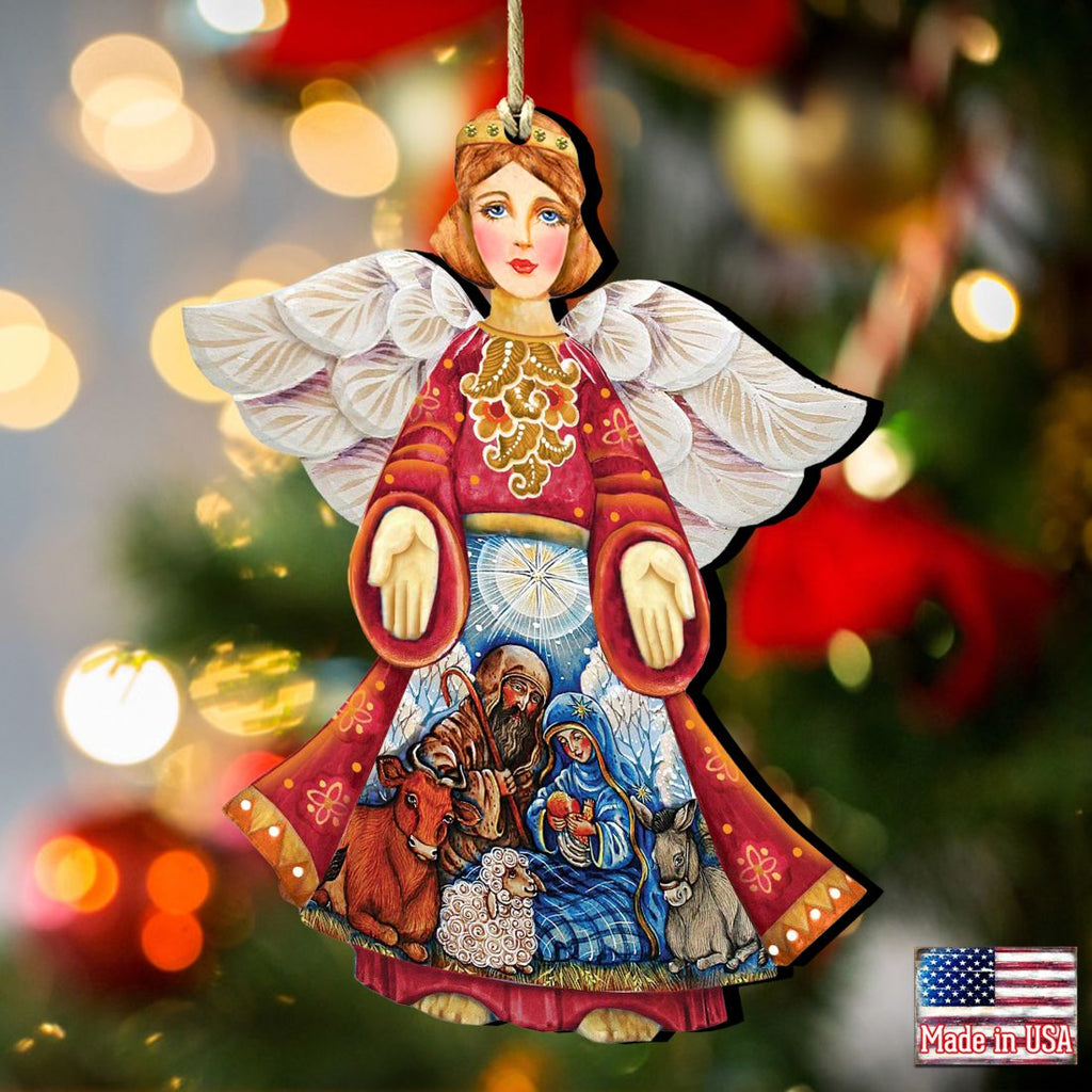 Nativity angel wooden ornament with gold-trimmed dress and detailed manger figures.